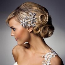 Bride with hair up and silver flowers in hair